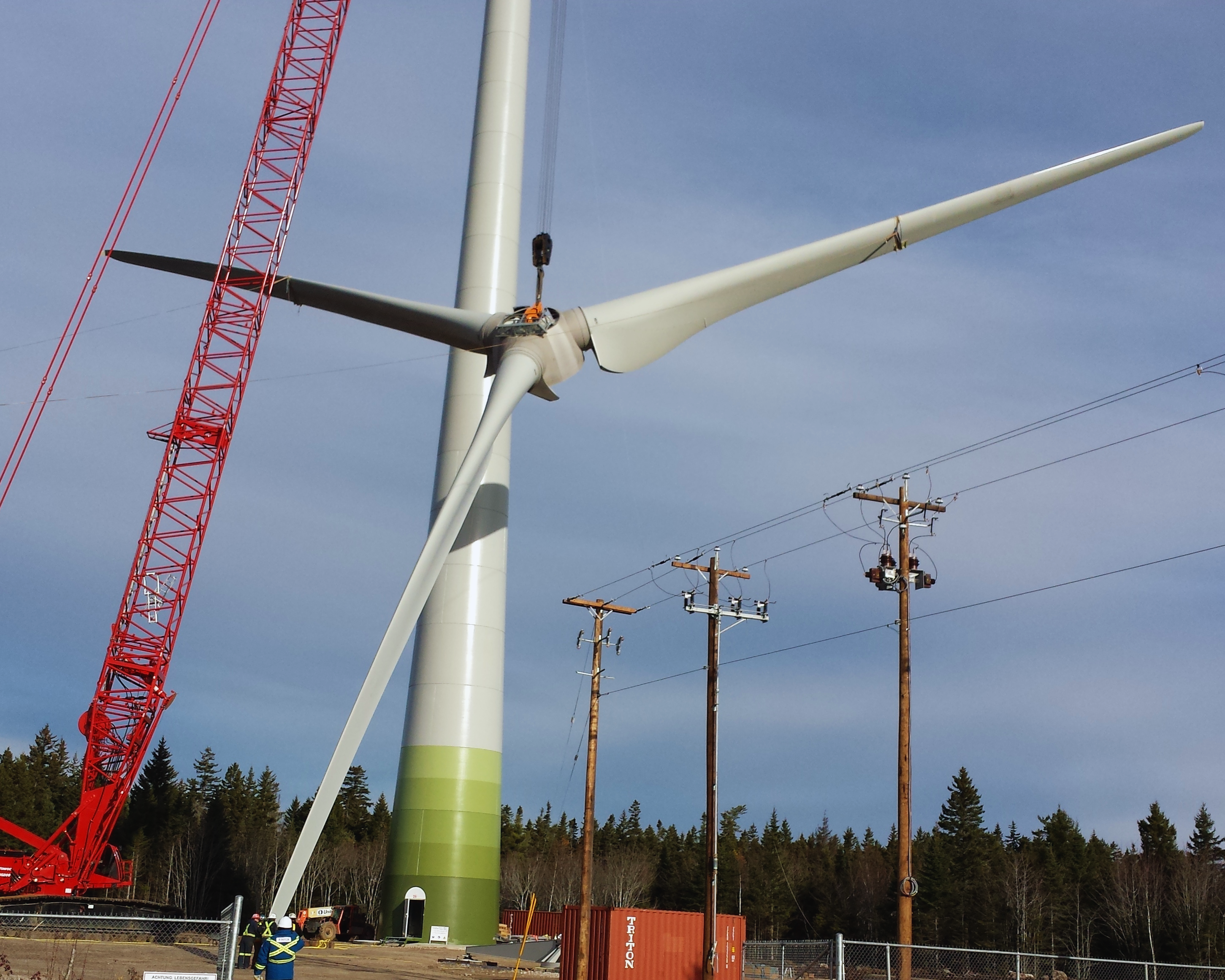 A wind turbine being constructed.